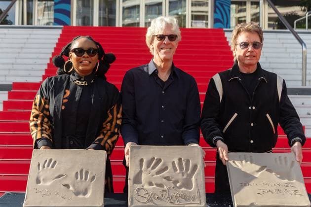 Bilder des Jahres 2024, Entertainment 01 Januar Entertainment Themen der Woche KW04 Entertainment Bilder des Tages Handprint Ceremony Jean-Michel Jarre - Cannes (L to R) Yemi Alade, Stewart Copeland and Jean-Michel Jarre posing with their own handprints at handprinting ceremony on January 25, 2024 at the Palais des Festivals in Cannes during MIDEM event in Cannes, France. Photo by Cyril Chateau ABACAPRESS.COM Cannes Alpes-Maritimes France  Copyright: xChateauxCyril ABACAx