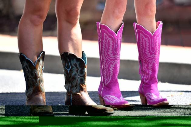 TAMWORTH COUNTRY MUSIC FESTIVAL 2024, Cowboy boots are worn by a festival goers during the 52nd Tamworth Country Music Festival in Tamworth, New South Wales, Friday, January 26, 2024. The biggest music festival in the country returns, with the 52nd Golden Guitar awards to be announced. ( NO ARCHIVING, EDITORIAL USE ONLY, NO USE IN BOOKS WITHOUT CONSENT TAMWORTH NEW SOUTH WALES AUSTRALIA  Copyright: xBIANCAxDExMARCHIx 20240126001893713929