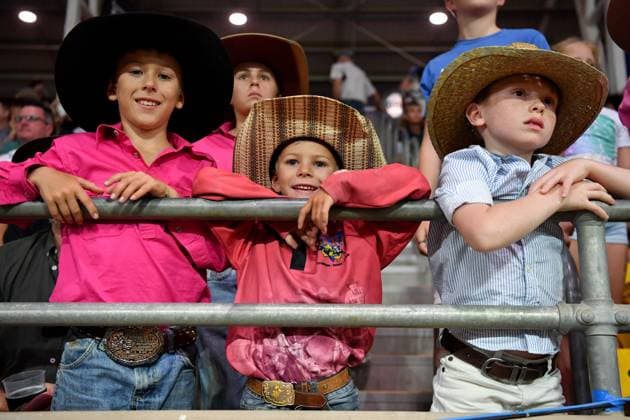 TAMWORTH COUNTRY MUSIC FESTIVAL 2024, Spectators are seen at the 2024 ABCRA National Finals Rodeo during the 52nd Tamworth Country Music Festival in Tamworth, New South Wales, Friday, January 26, 2024. The biggest music festival in the country returns, with the 52nd Golden Guitar awards to be announced. ( NO ARCHIVING, EDITORIAL USE ONLY, NO USE IN BOOKS WITHOUT CONSENT TAMWORTH NEW SOUTH WALES AUSTRALIA  Copyright: xBIANCAxDExMARCHIx 20240126001893870723