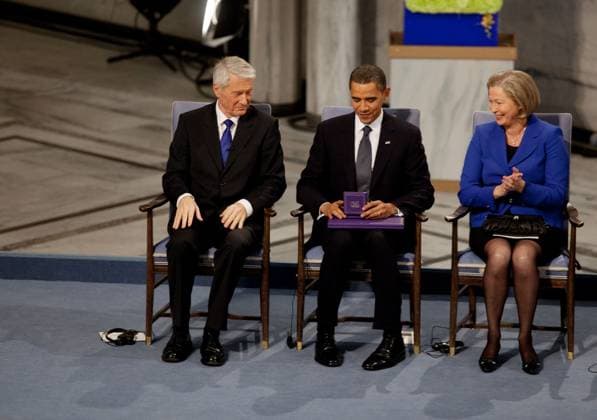 Accepting the Nobel Prize for Peace Oslo, Norway - December 10, 2009 -- United States President Barack Obama looks at the Nobel Prize medal during the Nobel Peace Prize ceremony in Raadhuset Main Hall at Oslo City Hall In Oslo, Norway, Thursday, December 10, 2009. .Mandatory Credit: Pete Souza - White House via CNP Oslo Norway EDITORIAL USE ONLY Copyright: xx P121009PS-0624 PetexSouzax cnpphotos022465