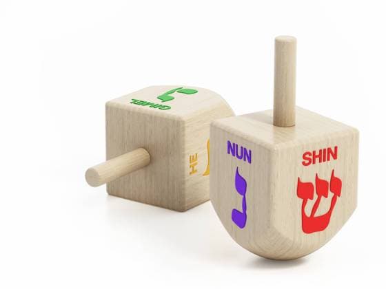 Hanukkah dreidels isolated on white background. 3D illustration Hanukkah dreidels isolated on white background. 3D illustration. Copyright: xZoonar.com CigdemxSimsekx 21097948