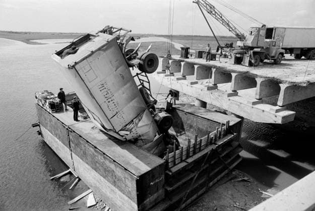Novgorod, USSR. The picture shows the refrigerator truck driven by an intoxicated driver S. Lagul after falling from a bridge under construction across the Maly Volkhovets River. The driver who received a closed fracture was taken to the hospital. Alexander Ovchinnikov TASS  17940982