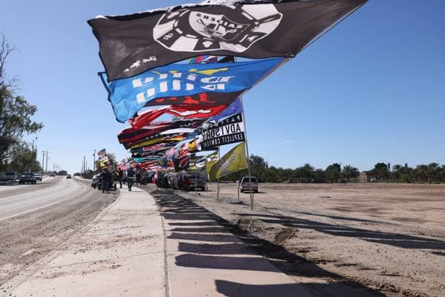 February 3, 2024, Yuma, Arizona, USA: Pro-Trump rallygoers fly dozens of flags at a Take Our Border Back convoy and protest in Yuma, Arizona. Yuma USA - ZUMAs298 20240203_zsp_s298_007 Copyright: xCalvinxStewartx
