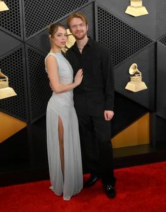 (L-R) Claudia Sulewski and FINNEAS attend the 66th annual Grammy Awards at the Crypto.com Arena in Los Angeles on Sunday, February 4, 2024.  LAP20240204218 JIMxRUYMEN