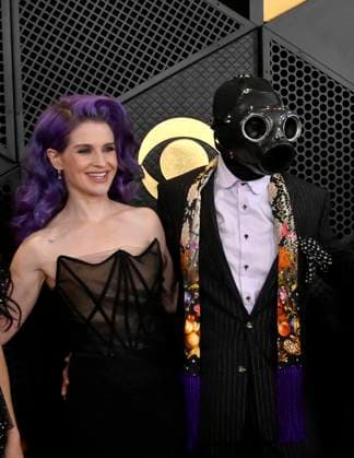 (L-R) Kelly Osbourne and Sid Wilson of Slipknot attend the 66th annual Grammy Awards at the Crypto.com Arena in Los Angeles on Sunday, February 4, 2024.  LAP20240204231 JIMxRUYMEN