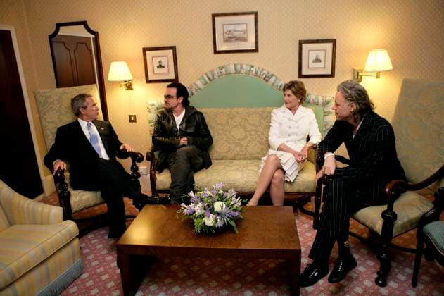 Bushs Meet Bono and Geldorf United States President George W. Bush, Bono, first lady Laura Bush, and Bob Geldof, far right, hold a working meeting on Africa at the G8 Summit in Gleneagles, Scotland, Wednesday, July 6, 2005. Mandatory Credit: Eric Draper White House via CNP Gleneagles Scotland EDITORIAL USE ONLY Copyright: xx EricxDraperx cnpphotos035947