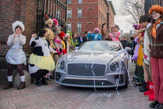 US actress Annette Bening, flanked by Harvard students, waves to the crowd during a parade, through the Harvard Yard in her honor, as she is named the Harvard University s Hasty Pudding Theatricals 2024 Woman of the Year in Cambridge, MA on Tuesday, February 06, 2024.  BOS20240206017 AmandaxSabga
