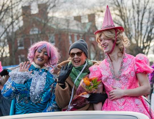 US actress Annette Bening, flanked by Harvard students, waves to the crowd during a parade, through the Harvard Yard in her honor, as she is named the Harvard University s Hasty Pudding Theatricals 2024 Woman of the Year in Cambridge, MA on Tuesday, February 06, 2024.  BOS20240206024 AmandaxSabga