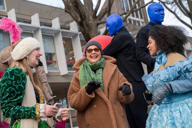 US actress Annette Bening, flanked by Harvard students, does a high reacts with students following a parade, through the Harvard Yard in her honor, as she is named the Harvard University s Hasty Pudding Theatricals 2024 Woman of the Year in Cambridge, MA on Tuesday, February 06, 2024.  BOS20240206032 AmandaxSabga