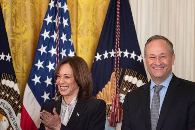 United States Vice President Kamala Harris and second gentleman Doug Emhoff smile as United States President Joe Biden delivers remarks at the Black History Month Reception at the White House in Washington, DC on Tuesday, February 6, 2024.  WAX2240206213 AnnabellexGordon