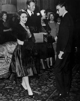 Princess Margaret of England speaking with Yves Saint-Laurent, 1958 (b w photo) 1262797 Princess Margaret of England speaking with Yves Saint-Laurent, 1958 (b w photo) by Unknown photographer, (20th century); (add.info.: Princess Margaret of England speaking with Yves Saint-Laurent, on november 12, 1958). Copyright: xBridgemanxImagesx 1262797