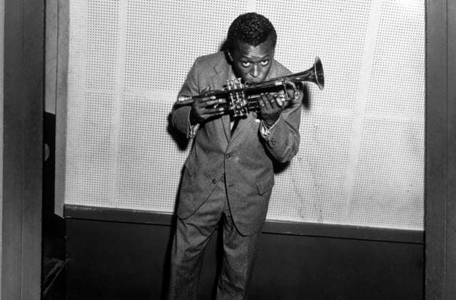 Miles Davis Kissing Trumpet C. 1954 (b w photo) 1653552 Miles Davis Kissing Trumpet C. 1954 (b w photo) by Unknown photographer, (20th century). Copyright: xBridgemanxImagesx 1653552