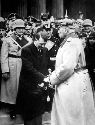 German President Paul von Hindenburg greeting Adolf Hitler, newly nominated chancellor January 30, 1933 in Berlin (b w photo) 1707699 German President Paul von Hindenburg greeting Adolf Hitler, newly nominated chancellor January 30, 1933 in Berlin (b w photo); (add.info.: behind Hitler we see Hermann Goering (l) and Joseph Goebbels (far-left)). Copyright: xBridgemanxImagesx 1707699