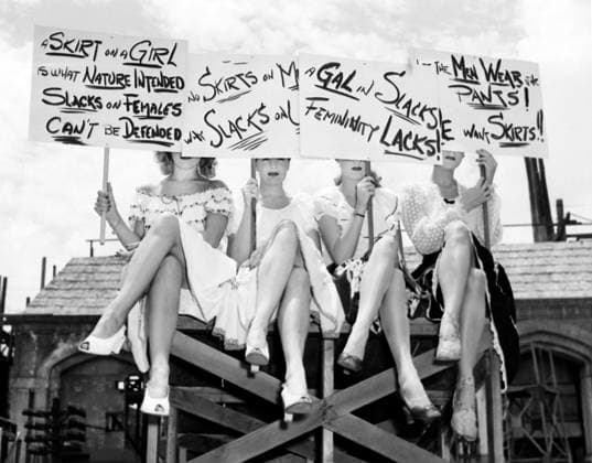 Group of Goldwyn Girls in Skirts Holding Signs in Anti-Slacks Protest for their upcoming Film, The Kid from Brooklyn , 1945  Copyright: xJTxVintagex xGlasshousexImagesx jtv004894