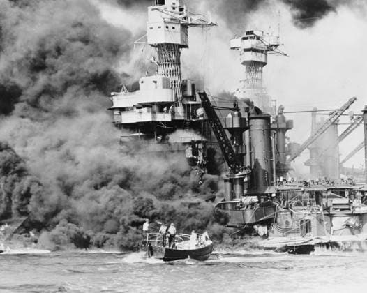 A small boat rescues a seaman from USS West Virginia burning in the foreground, 1941 (b w photo) 1766209 A small boat rescues a seaman from USS West Virginia burning in the foreground, 1941 (b w photo) by American Photographer, (20th century); Private Collection; (add.info.: 31,800 ton USS West Virginia burning with USS Tennessee inboard The attack by the Imperial Japanese Navy against the United States naval base at Pearl Harbor in Hawaii on the morning of December 7th 1941 led to the United States entry into World War II.). Copyright: xBridgemanxImagesx 1766209