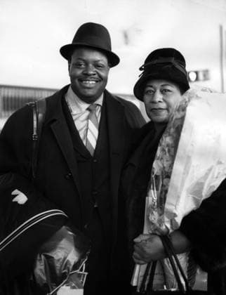 Ella Fitzgerald and her pianist Oscar Peterson 2029056 Ella Fitzgerald and her pianist Oscar Peterson by Unknown photographer, (20th century); (add.info.: Ella Fitzgerald and her pianist Oscar Peterson at London Airport March 4, 1961). Copyright: xBridgemanxImagesx 2029056