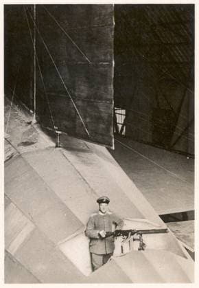 Picture No. 50: Soldier at a machine gunpost on the German military arship LZ90, from Zeppelin-Weltfahrten... , 1933 (silver bromide print) RYS347419 Picture No. 50: Soldier at a machine gunpost on the German military arship LZ90, from Zeppelin-Weltfahrten... , 1933 (silver bromide print) by German School, (20th century); Private Collection; (add.info.: ...Vom ersten Luftschiff 1899 bis zu den Fahrten des LZ 127 Graf Zeppelin 1932 ; from the chapter Kriegs-Luftschiffe ; Heck-Maschinengewehrstand eines Armee-Luftschiffe;). Copyright: xBridgemanxImagesx 347419
