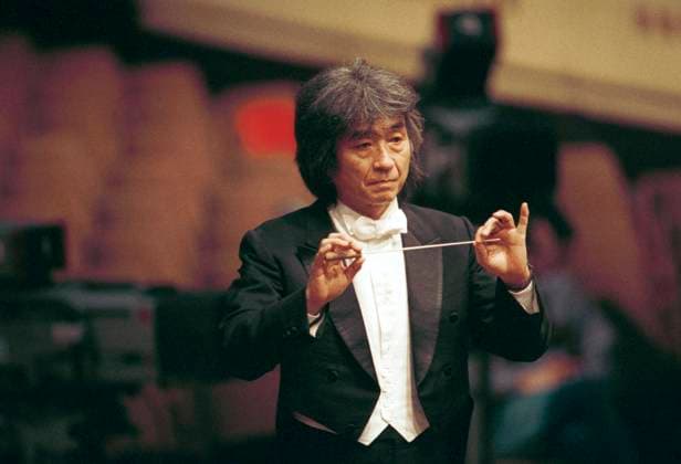 ***FILE PHOTO*** Japanese conductor Seiji Ozawa leads the Boston Symphony Orchestra at the Smetana Hall of the Municipal House in Prague, Czech Republic, on December 16, 1993. (CTKxPhoto JaroslavxHejzlar) CTKPhotoFO00022607  CTKPhotoFO00022607