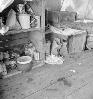 Tent interior in a pea pickers camp, California, 1939 (b w photo) 3738862 Tent interior in a pea pickers camp, California, 1939 (b w photo) by Lange, Dorothea (1895-1965); Private Collection; (add.info.: Food supply and household equipment. Santa Clara County, California ). Copyright: xBridgemanxImagesx 3738862