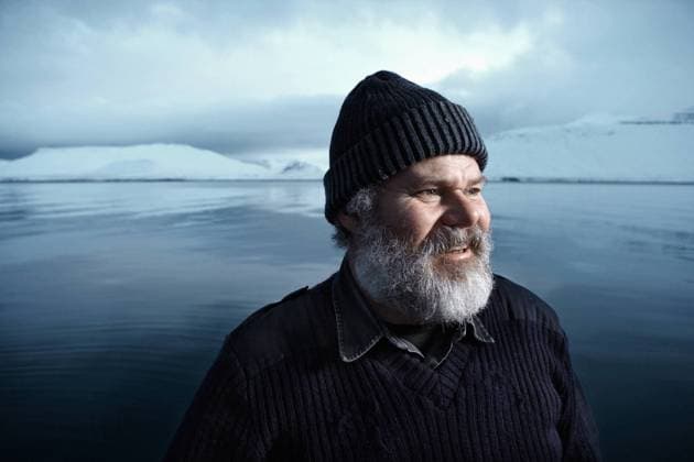 Creative Highlights Symbolbilder A man with a gray beard in winter landscape Grundarfjörður, Grundarfjarðarbær, Iceland CR_EZDKCL240207-1345989-01 ,model released, Symbolfoto