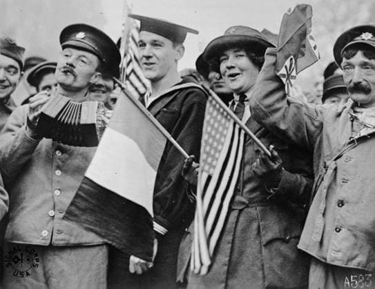 Armistice Day in Paris, 1918 (b w photo) 4072721 Armistice Day in Paris, 1918 (b w photo) by American Photographer, (20th century); Private Collection; (add.info.: An American gob, two British Tommys, and a Red Cross girl ohotographed on Armistice Day 11th November by United States Army Signal Corp). Copyright: xBridgemanxImagesx 4072721
