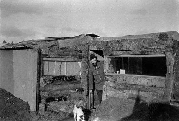First World War 1914-1918 (14-18): French soldier (hairy) with his dog in front of his  cagna (makeshift shelter in the trench, made of recuperation materials) - trchees - front - negative anonymous photographic, private collection - PCT4285301 First World War 1914-1918 (14-18): French soldier (hairy) with his dog in front of his  cagna (makeshift shelter in the trench, made of recuperation materials) - trchees - front - negative anonymous photographic, private collection -; (add.info.: First World War 1914-1918 (14-18): French soldier (hairy) with his dog in front of his  cagna (makeshift shelter in the trench, made of recuperation materials) - trchees - front - negative anonymous photographic, private collection Copyright: x xPatricexCartier.xAllxrightsxreservedx2023x xBridgemanxImagesx 4285301