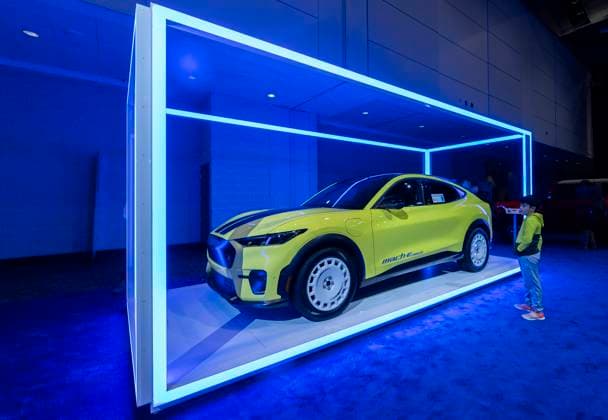 (240217) -- TORONTO, Feb. 17, 2024 -- A boy looks at a Ford Mustang Mach-E electric car during the 2024 Canadian International AutoShow in Toronto, Canada, Feb. 16, 2024. The annual 2024 Canadian International AutoShow kicked off here on Friday to showcase the latest innovations, trends and advancements in the automotive world with the participation of 45 automotive brands. (Photo by Xinhua) CANADA-TORONTO-CANADIAN INT L AUTOSHOW ZouxZheng 