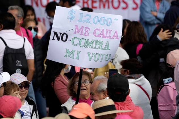 February 18, 2024, Mexico City, Mexico: Persons join the rally to support Ã¢â‚¬oeMarch for Our DemocracyÃ¢â‚¬Â movement at the Mexico City Zocalo. on February 18, 2024 in Mexico City, Mexico Mexico City Mexico - ZUMAe321 20240218_zia_e321_008 Copyright: xLuisxBarronx