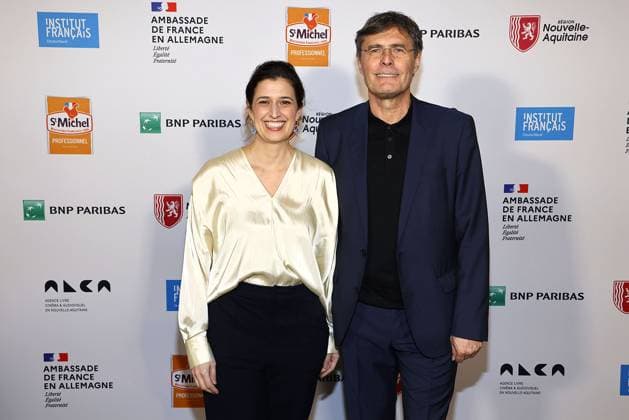 The two award winners Leila Hamid and Martin Kochendoerfer both X Verleih AG at the award ceremony of the Order of the Chevalier for Art and Literature during the Berlinale Soiree Francaise du Cinema at the French Embassy on 19 02 2024 in Berlin Berlinale Soiree Francaise 2024 Award of the Chevalier Order for Leila Hamid Martin Kochendoerfer