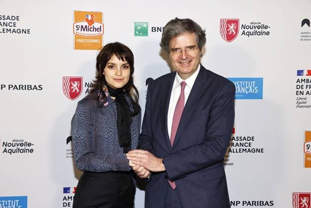 Luise Befort with the French Ambassador Francois Delattre at the award ceremony of the Order of the Chevalier for Art and Literature during the Berlinale Soiree Francaise du Cinema at the French Embassy on 19 February 2024 in Berlin Berlinale Soiree Francaise 2024 Award of the Chevalier Order for Leila Hamid Martin Kochendoerfer