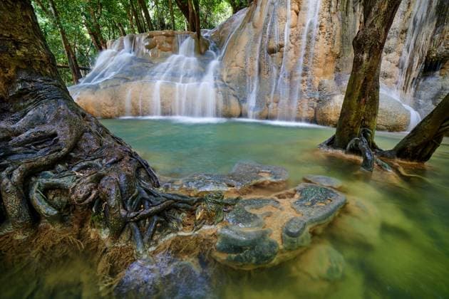 Scenic view of waterfall in forest Phiman, Satun, Thailand R_GXKV24021496-1354252-01