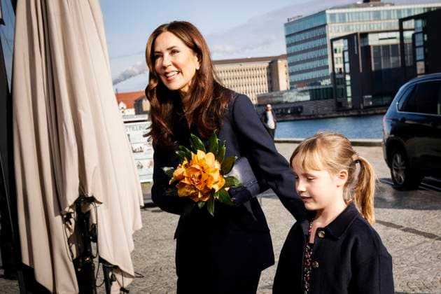 Queen Mary is received by Education and Research Minister Christina Egelund M and flower girl Lily upon arrival at the EliteForsk awards ceremony in Den Sorte Diamant in Copenhagen, Monday 26 February 2024 The Ministry of Education and Research annually awards EliteForsk awards to the leading  Copyright: RitzauxScanpix IdaxMariexOdgaardx COP15783 spdk20240226-162833-L