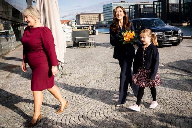 Queen Mary is received by Education and Research Minister Christina Egelund M and flower girl Lily upon arrival at the EliteForsk awards ceremony in Den Sorte Diamant in Copenhagen, Monday 26 February 2024 The Ministry of Education and Research annually awards EliteForsk awards to the leading  Copyright: RitzauxScanpix IdaxMariexOdgaardx COP15783 spdk20240226-162845-L