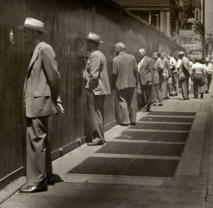 Row of men standing on sidewalk looking through round peep holes at new construction site, New York City, New York, USA, Angelo Rizzuto, Anthony Angel Collection, July 7, 1949 Row of men standing on sidewalk looking through round peep holes at new construction site, New York City, New York, USA, Angelo Rizzuto, Anthony Angel Collection, July 7, 1949. Copyright: 1010_16_ghi-circa12198