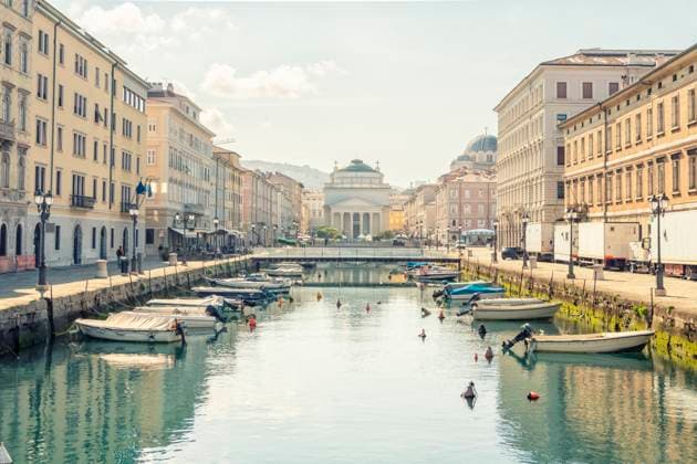 Italy, Friuli-Venezia Giulia, Trieste, Boats moored along Canal Grande in summer, Trieste Italy TAMF04190