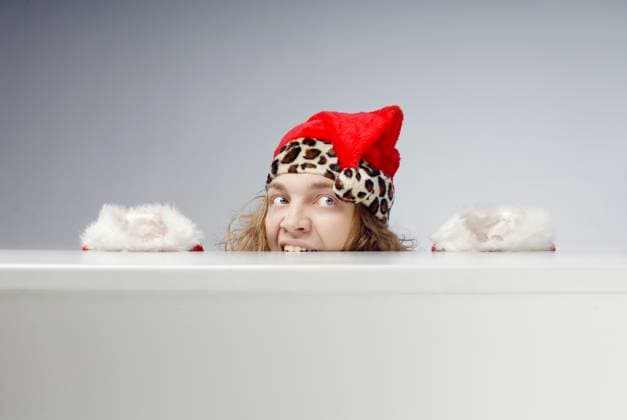 Afraid hidden Santa Funny photo of the afraid Santa Claus hidden under the table. Gray background can be easily replaced by any others ,model released, Symbolfoto Copyright: xZoonar.com ArmanxZhenikeyevx 3758959 ,model released, Symbolfoto ,property released