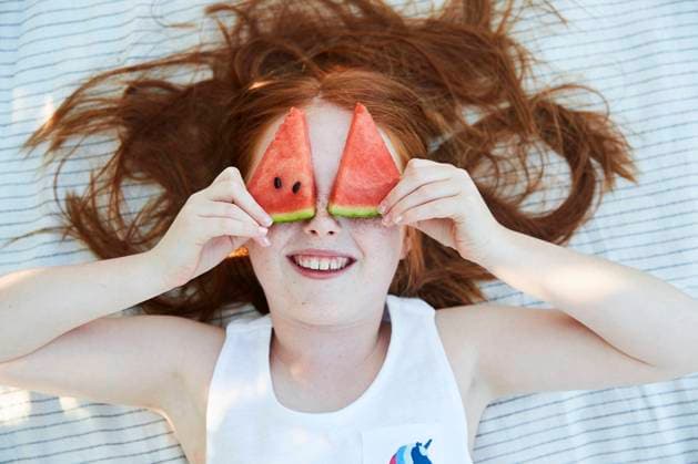 Girl and slices of water melon , model released Copyright: xJohnerxImagesx , johner2292561.jpg 