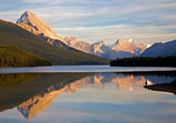 Male fly fisherman at Maligne Lake, Jasper National Park, Alberta, Canada.  Copyright: x xAllxCanadaxPhotosx 1990-75163