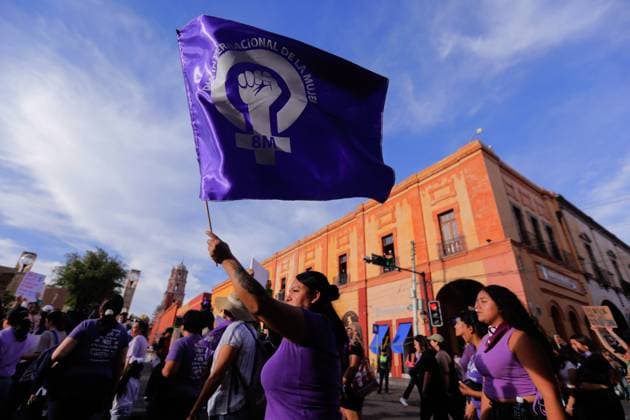 Women s Day demonstration in Queretaro A woman waves a flag during a Women s Day demonstration. Women from Querétaro Mobilized for International Women s Day. The march for 8M in Querétaro concluded in the Plaza de la Constitución where women demanded an end to violence and that their rights be respected. Queretaro Mexico Copyright: xCesarxGomezx xSOPAxImagesx _EGR1462