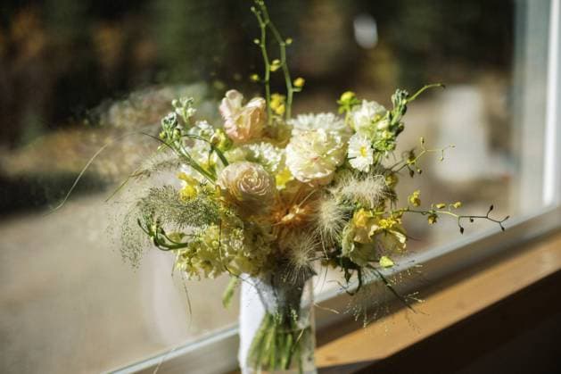 Windowsill display of natural wispy floral wedding bouquet Breckenridge, Colorado, United States R_UTNS240307-1365455-01