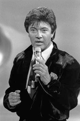 Rex Gildo, Schlagersänger, bei einem Fernsehauftritt in Hamburg im Januar 1987 *** Rex Gildo, pop singer, at a television appearance in Hamburg in January 1987