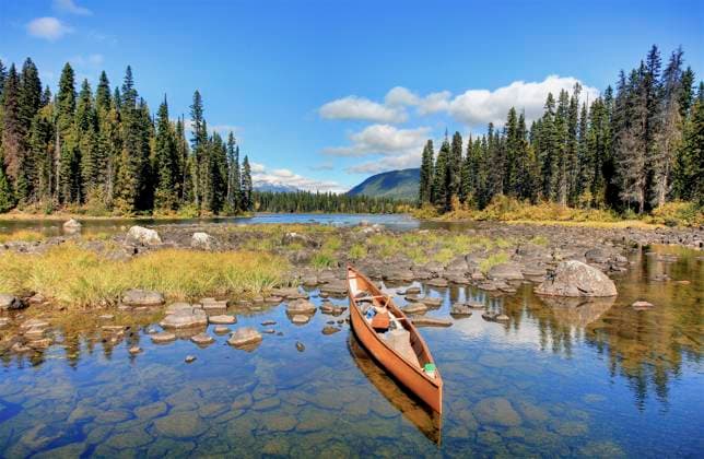 a canoe in Diamond Lagoon, Murtle Lake, Wells Gray Park, British Columbia, Canada, Darrel Giesbrecht  Copyright: x xAllxCanadaxPhotosx 1990-11049479