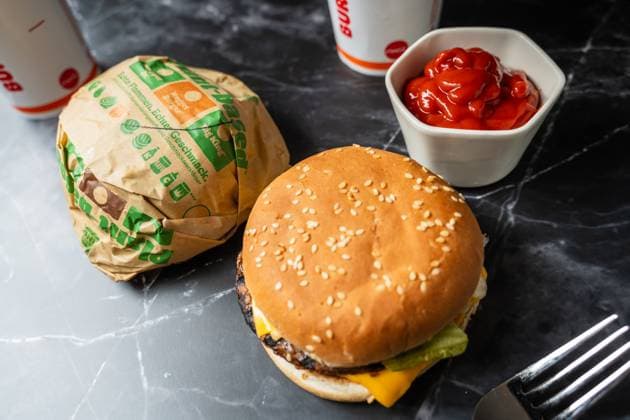 Augsburg, Bavaria, Germany - March 16, 2024: Plant-based hamburger from the fast food chain Burger King. Meat substitute for a vegan diet *** Plant-Based Hamburger von der Fastfood Kette Burger King. Fleischersatz für vegane Ernährung