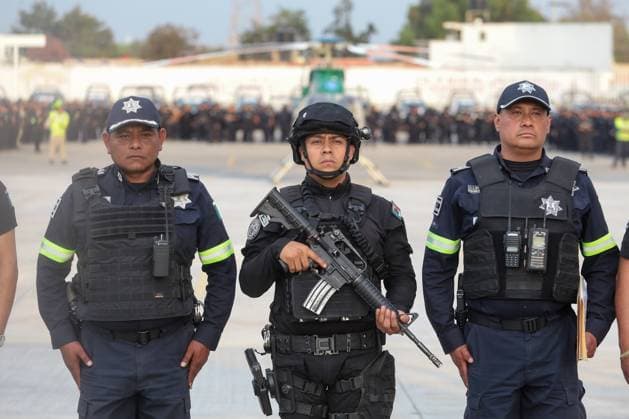 March 15, 2024, Ecatepec de Morelos, Mexico: A member of the State Police during the departure of a security operation called Rastrillo to combat crime in the Municipality of Ecatepec. More than 1,300 elements from the Attorney General s Office of the Republic (FGR), the Attorney General s Office of the State of Mexico (FGJEM) and the State Police take part during the Operation. on March 15, 2024 in Ecatepec de Morelos, Mexico. Ecatepec De Morelos Mexico - ZUMAe321 20240315_zia_e321_030 Copyright: xRickxCruzx