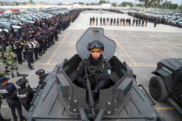 March 15, 2024, Ecatepec de Morelos, Mexico: A member of the State Police during the departure of a security operation called Rastrillo to combat crime in the Municipality of Ecatepec. More than 1,300 elements from the Attorney General s Office of the Republic (FGR), the Attorney General s Office of the State of Mexico (FGJEM) and the State Police take part during the Operation. on March 15, 2024 in Ecatepec de Morelos, Mexico. Ecatepec De Morelos Mexico - ZUMAe321 20240315_zia_e321_027 Copyright: xRickxCruzx