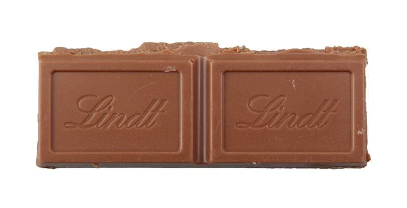 Pomorie, Bulgaria - April 29, 2020: Lindt Lindor milk chocolate isolated on white background. Chocoladefabriken Lindt & Sprüngli AG is a Swiss chocolatier and confectionery company founded in 1845 Pomorie, Bulgaria - April 29, 2020: Lindt Lindor milk chocolate isolated on white background. Chocoladefabriken Lindt Sprüngli AG is a Swiss chocolatier and confectionery company founded in 1845 Copyright: xZoonar.com VladimirxNenovx 15412793