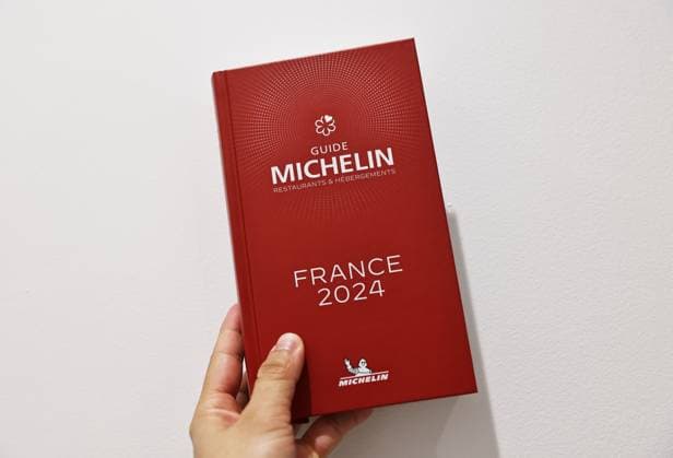 (240319) -- TOURS, March 19, 2024 -- The 2024 edition of the Michelin Guide for France is pictured in Tours, France, March 18, 2024. The Michelin Guide launched its 2024 France edition on Monday in Tours. ) FRANCE-TOURS-MICHELIN GUIDE GaoxJing 