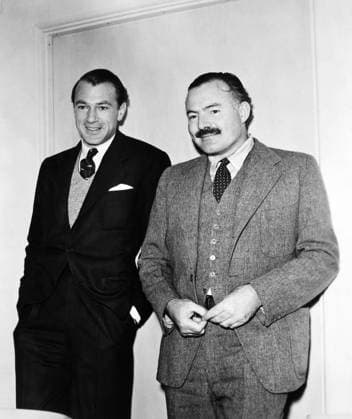 ERNEST HEMINGWAY (1899-1961). American writer. With actor Gary Cooper (left), c1941.  Copyright: xGRANGERx xGRANGERx 0018097