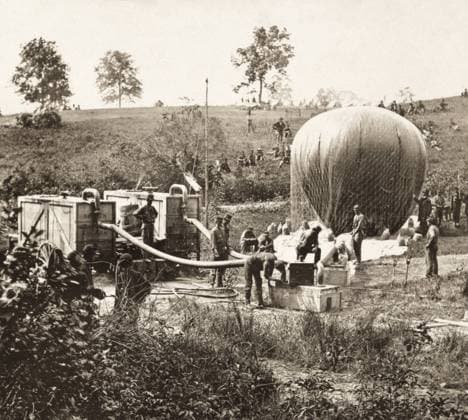 CIVIL WAR: BALLOON, 1862. Professor Thaddeus Sobieski Coulincourt Lowe inflating his reconnaissance balloon Intrepid on Gaines Hill, Virginia, shortly before the Battle of Fair Oaks during the American Civil War, May 1862. Photograph by Mathew Brady or one of his assistants.  Copyright: xGRANGERx xGRANGERx 0029231