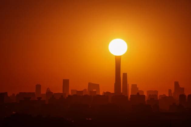 Creative Highlights World BEIJING, CHINA - MARCH 20: The sun rises from buildings at CBD area on March 20, 2024 in Beijing, China. Today marks Spring Equinox (Chunfen), the fourth solar term of the traditional Chinese calendar. On the day of the Spring Equinox, the sun is directly above the equator.  Copyright: xChinaxNewsxServicex 111486625969